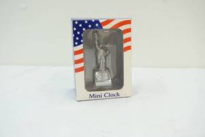 lot 184 image: Mini clock