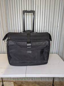 lot 102 image: Wheeled Suitcase with Retractable Handle