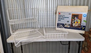 lot 108 image: Five White Wire Storage Racks