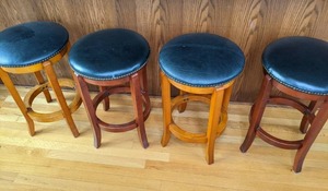 lot 79 image: Four Swivel Bar Stools with Padded Seats