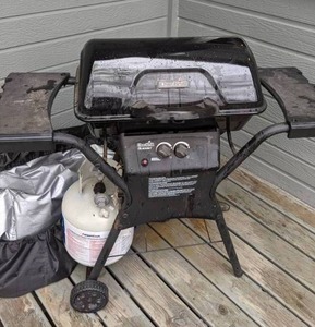 lot 50 image: Gas Grill w Propane Tank and Cover