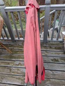 lot 58 image: Faded Red Patio Umbrella