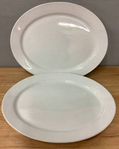 lot 51 image: Lot of Two 12 Porcelain Rimmed Oval Serving Platters - White