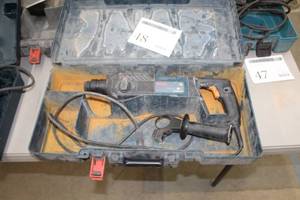 lot 48 image: Bosch Bulldog Drill 11224VSR  with Plastic Case