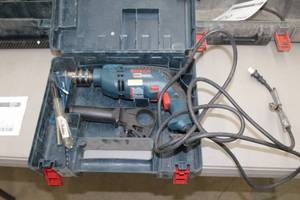 lot 50 image: Bosch Drill 1191VSR  with Plastic Case