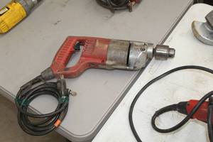 lot 94 image: Milwaukee Drill Heavy Duty  12