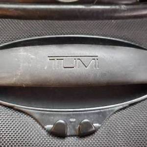 lot 94 image: Rolling Tumi Luggage Bag Group