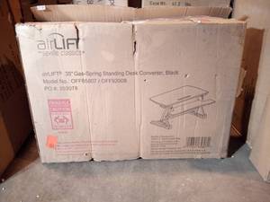 lot 81 image: AIRLIFT Black 35.4 in. Height Adjustable Standing Desk Converter Workstation with Dual Monitor Riser and Keyboard Tray by Seville Classics