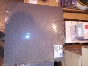 lot 180 image: BlackGray 24 in. x 24 in. x 0.51 in. Foam Interlocking Reversible Floor Mat (6-Pack) by Norsk
