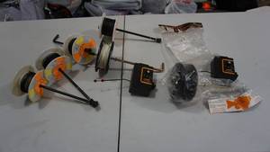 lot 75 image: Fish Hole Buddy Rattle Reels  Lindell Auto Jiggers