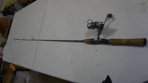 lot 90 image: IM7 Fishing Rod & Reel