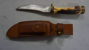 lot 134 image: Hunting Knife and Sleeve