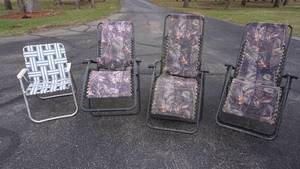 lot 155 image: 3 Camouflage Zero Gravity Lounge Chairs and a Web Strap Lawn Chair