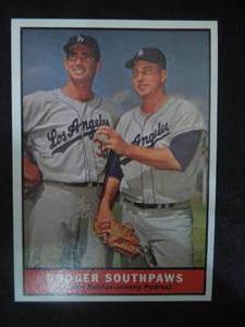 lot 27 image: 1961 Topps #207 Dodger SouthpawsSandy KoufaxJohnny Podres