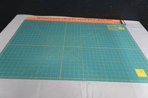 lot 77 image: OLFA ROTARY MAT
