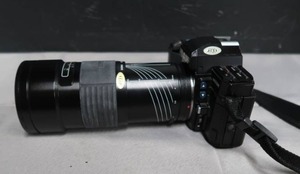 lot 136 image: MINOLTA CAMERA EXTRA LENSES FLASH