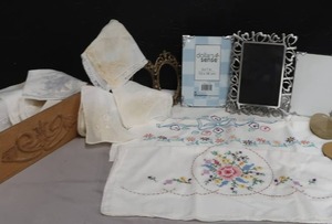 lot 157 image: VINTAGE SEWING MACHINE DRAWER WITH LINNENS AND FRAMES.