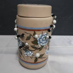 lot 172 image: DOLLY WAGNER COVERED JAR AND A NECKLACE