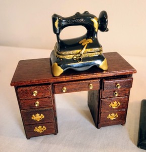 lot 107 image: Miniature Sewing Machines