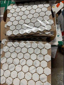 lot 24 image: Lifeproof Carrara 10 in. x 12 in. x 6.35 mm Ceramic Hexagon Mosaic Floor and Wall Tile (0.81 sq. ft.Each)