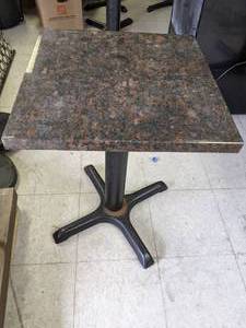 lot 21 image: 18 x 18 Granite Table w Cast Iron Base