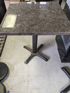 lot 24 image: 25.5 x 25.5 Granite Table w Cast Iron Base