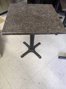 lot 28 image: 25.5 x 25.5 Granite Table w Cast Iron Base
