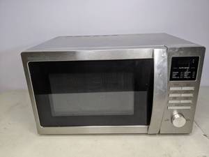 lot 32 image: Sharp Stainless Steel Countertop Microwave