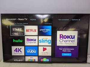 lot 7 image: 49 Sharp Roku Smart TV w Remote