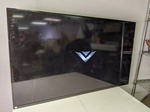 lot 16 image: Vizio 48 Wall Mount TV w Roku Streaming Stick