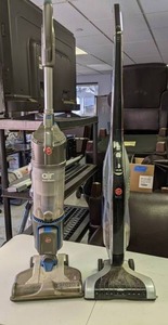 lot 145 image: Two Hoover Windtunnel Cordless Vacuums & Charger