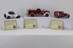 lot 38 image: (3) National Motor Museum Mint 132 1932 Ford Police Car, 1932 Chevrolet, 1938 Ford Fire Engine Bedford Falls