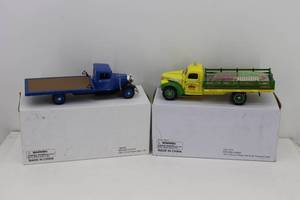lot 72 image: (2) National Motor Museum Mint 132 41 Chevy Flatbed & 34 Ford Flatbed