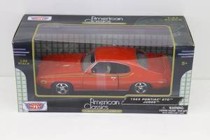 lot 73 image: American Classics 124 1969 Pontiac GTO Judge