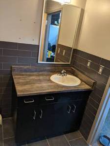 lot 15 image: Bathroom Vanity & Sink, Mirror, Light Fixture