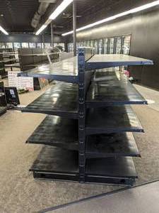 lot 28 image: 16 Ft. Two Sided Metal Retail Display Rack