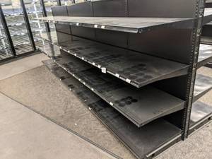 lot 35 image: 14 Ft. Two Sided Metal Retail Display Rack