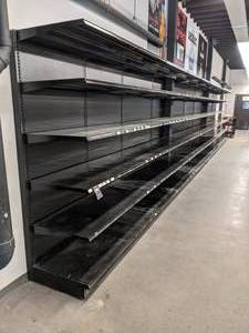 lot 39 image: 38 Ft. Wall Mount Display Rack & 4 Ft. Display Rack