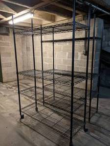 lot 61 image: Pair of Tall Black Metal Shelving Units