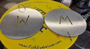 lot 133 image: Circular Metal W Signs
