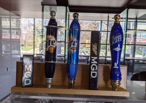 lot 76 image: Five Beer Tap Handles MGD, Miller Lite, Premium Light