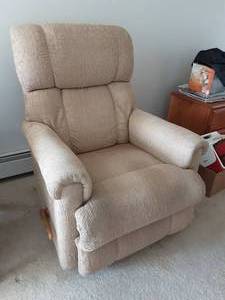 Tan Swivel RockerRecliner Chair