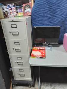 lot 26 image: Hon 4-Drawer File Cabinet, Box Of File Folders, HP 22 Computer Monitor (w2207h)