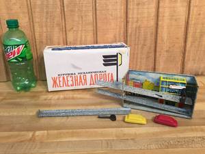 lot 14 image: Vintage Russian Wind-Up Tin Toy Garage