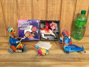 lot 49 image: 4 Tin Litho Wind-Up Metal Toys