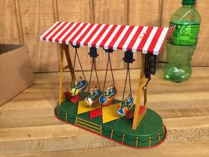 lot 92 image: Tin Litho JW Altes Wind-Up Carnival Boat Swing