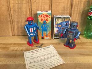 lot 96 image: Schylling - Masudaya Tin Wind-Up Robots