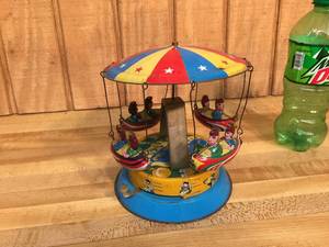 lot 102 image: Vintage Look Tin Litho Friction Flying Boat Swing