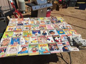 lot 127 image: 60 plus Vintage MAD Magazines and a Wristwatch
