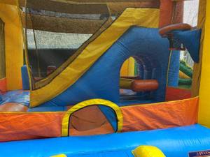 lot 2A image: Tiki 4 in 1 obstacle course slide combo Inflatable
